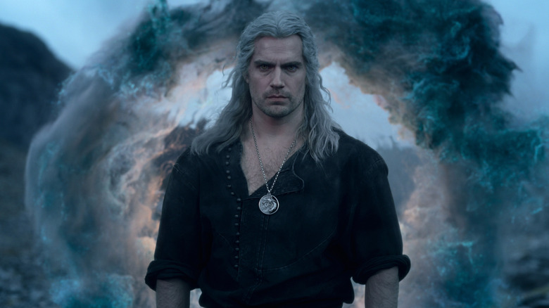Geralt standing in front of wispy smoke in "The Witcher" (2019-present)