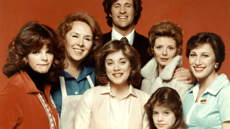The cast of "Angie" smiling
