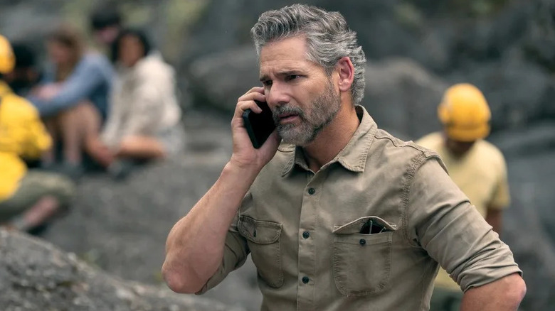 Kyle talks on his cell phone in Untamed