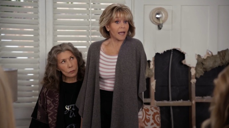 Grace and Frankie scold a woman offscreen in Grace and Frankie
