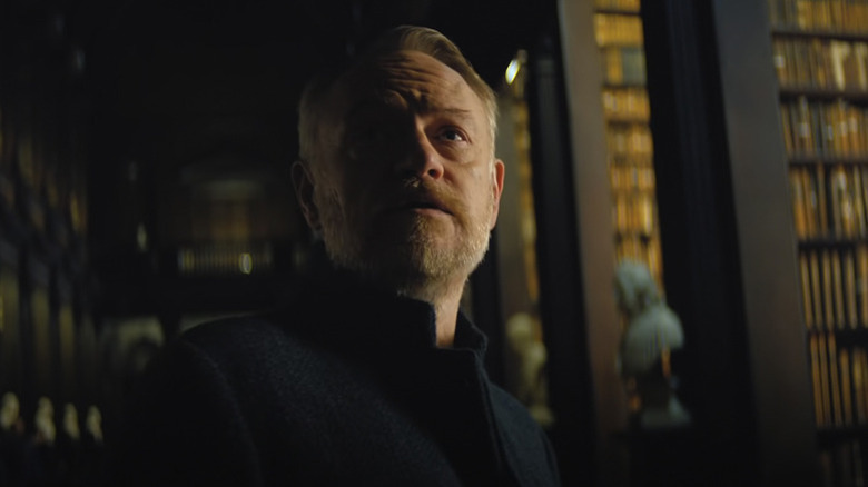 Seldon stands in his library in Foundation (2021-)