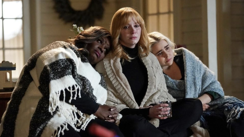 Ruby, Beth and Annie in blankets on couch