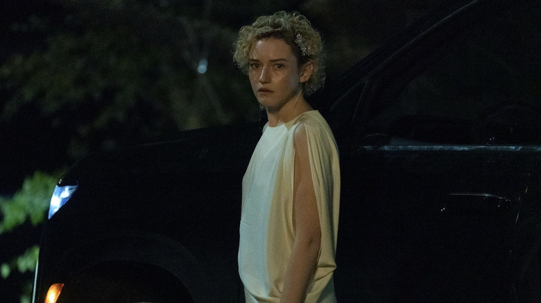 Ruth Langmore outside in formal clothes looking at camera