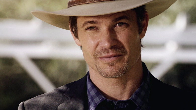Raylan Givens squints in the sun in Justified.