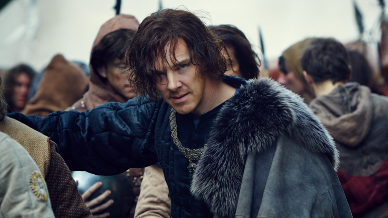 Benedict Cumberbatch as Richard of Gloucester hunched over in crowd