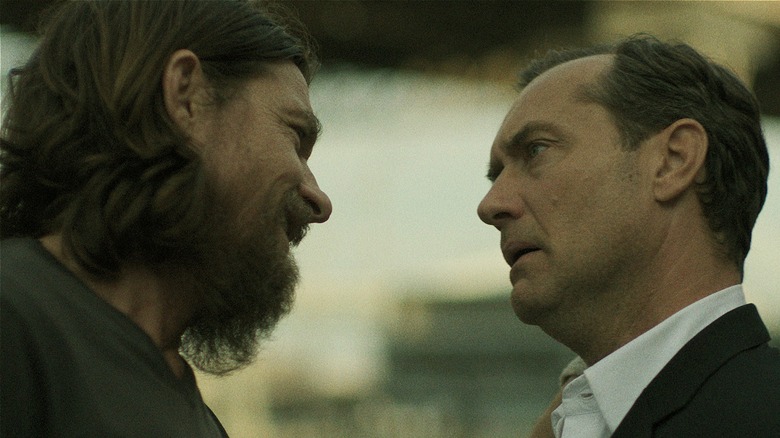 Jake and Vince looking at each other in 