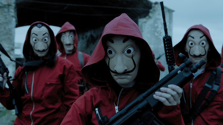 The heist group holding guns in "Money Heist" (2017-2021)