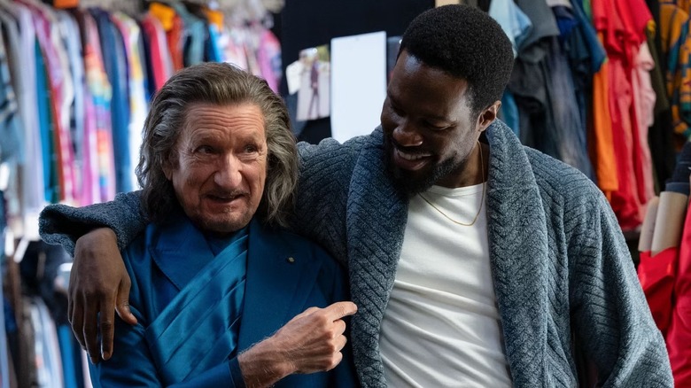 Simon puts his arm around Trevor as they both smile in "Wonder Man"