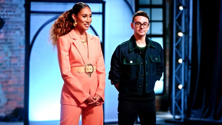 Judge Elaine Welterose and host Christian Siriano standing on the Project Runway runway