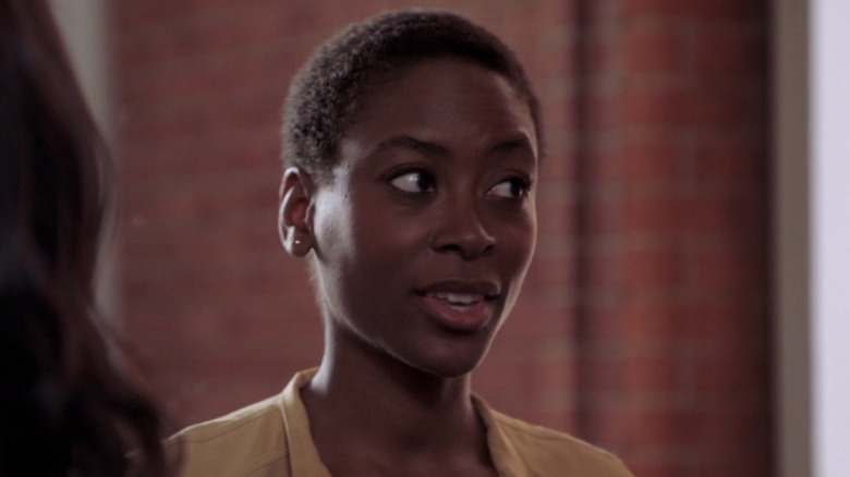 Lydia talking to someone out of frame to her left in Quantico (2015)