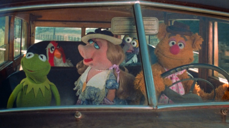 The Muppets riding in a car together in The Muppet Movie