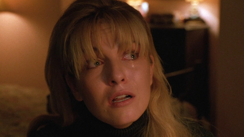 Laura Palmer with fearful tears in her eyes in Twin Peaks: Fire Walk With Me