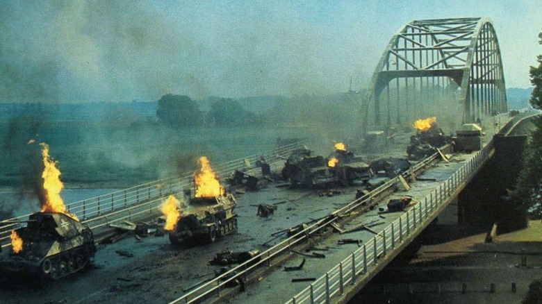 Destroyed vehicles on a bridge during Operation Market Garden in "A Bridge Too Far"