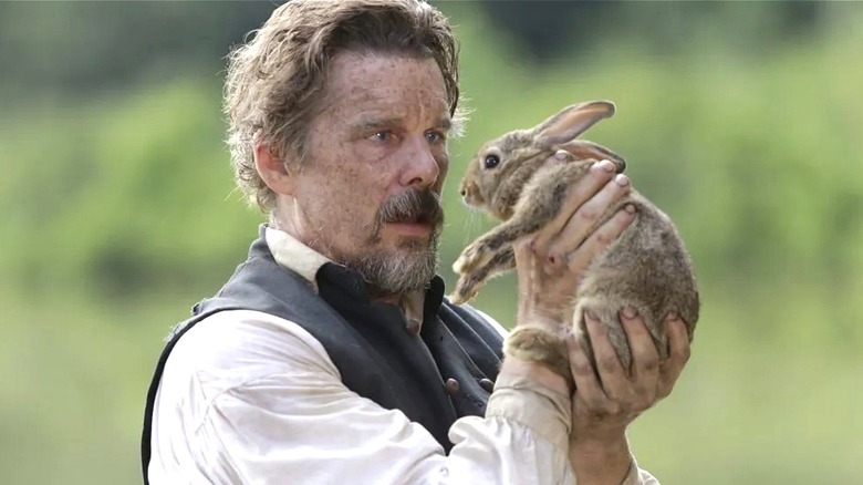 John Brown holding a rabbit on The Good Lord Bird (2020)