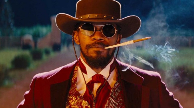 Django smoking while wearing sunglasses at night in Django Unchained