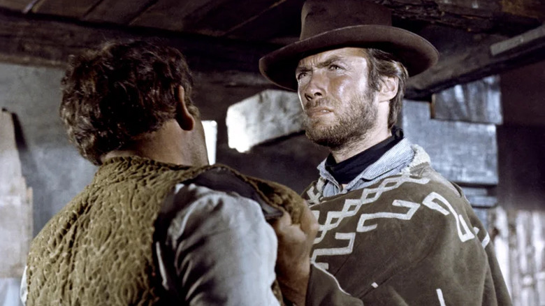 The Man With No Name holds up a bandit in For a Few Dollars More