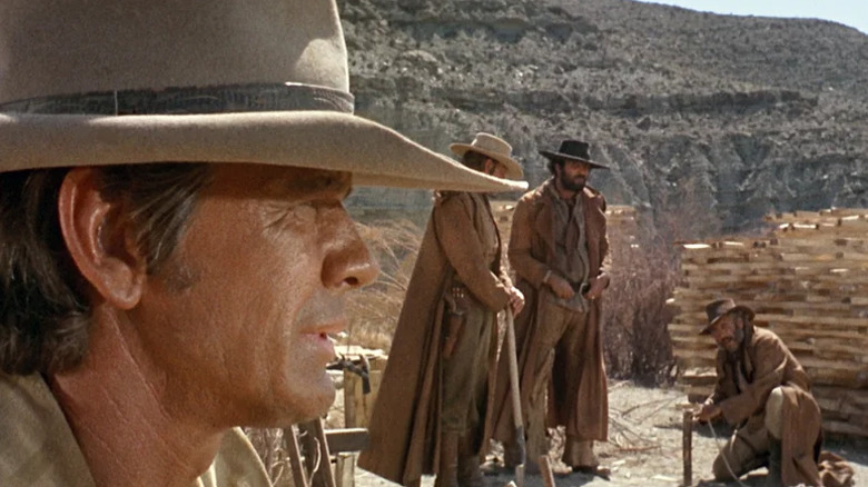 Harmonica looks out over in the commotion Once Upon a Time in the West