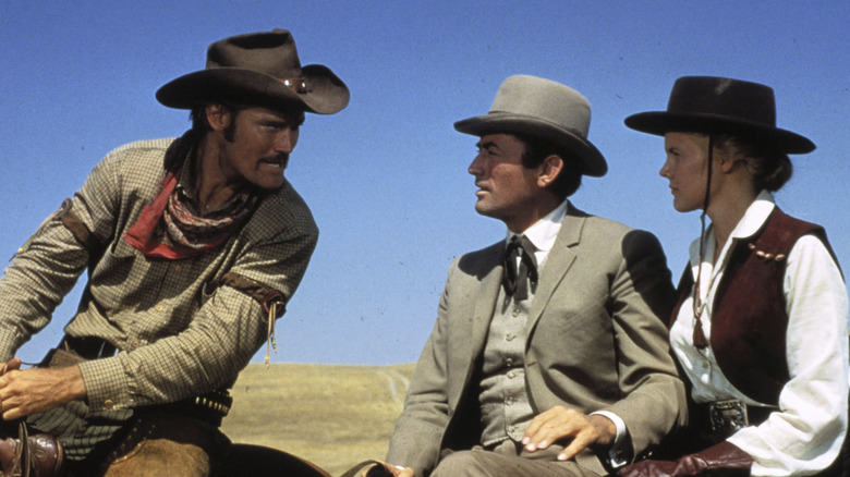 Buck Hannassey confronts James McKay and Patricia Terrill on horseback in The Big Country (1958)