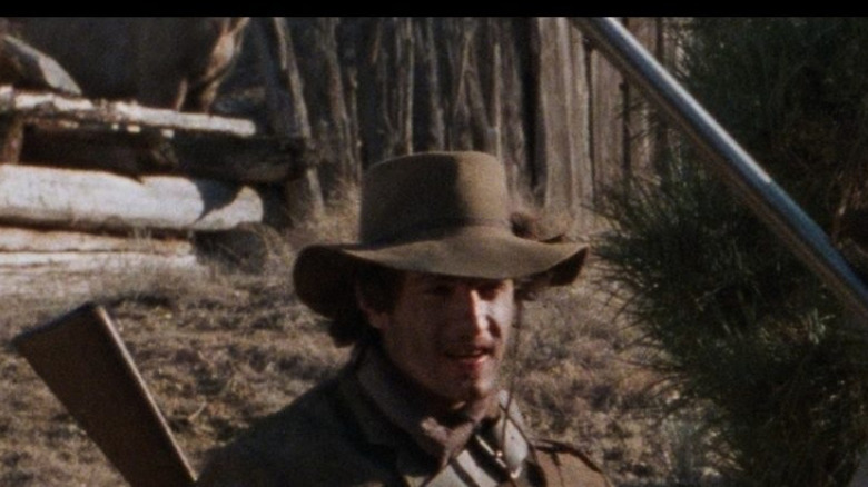 The gang gathered around in Young Guns (1988)