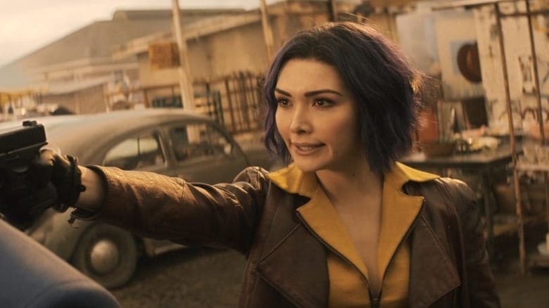 Faye holding a gun up to someone in "Cowboy Bebop" (2021)