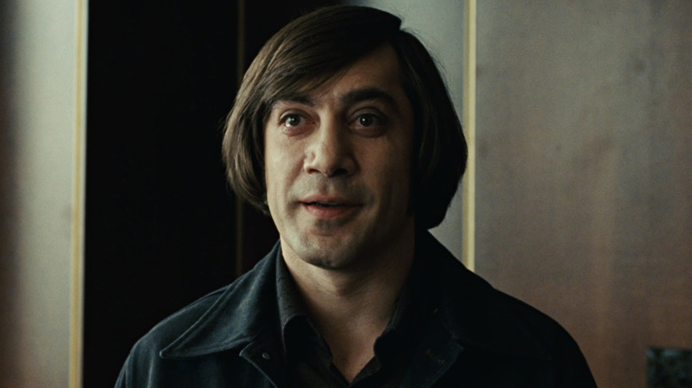 Chigurh speaks wearing black shirt