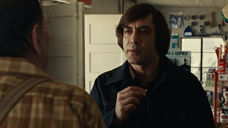 Anton Chigurgh intimidates