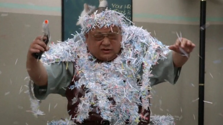 Waymond covered in shredded paper