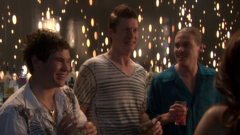 The guys smile at a club