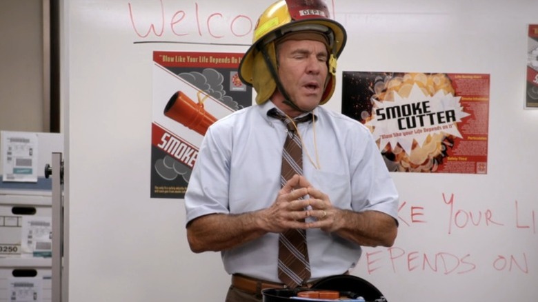 Ted wears fireman hat