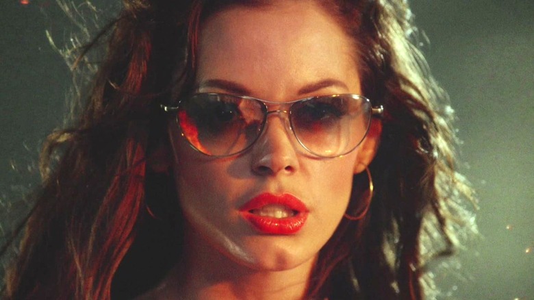 Cherry wearing sunglasses and gritting her teeth in "Planet Terror"