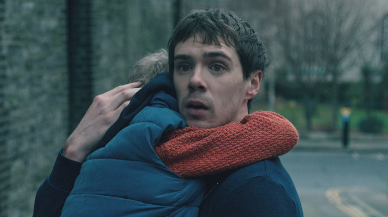 Senan holding and hugging Cillian in "The Cured"