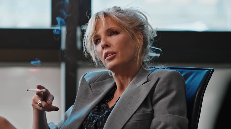 Beth Dutton smoking in office chair