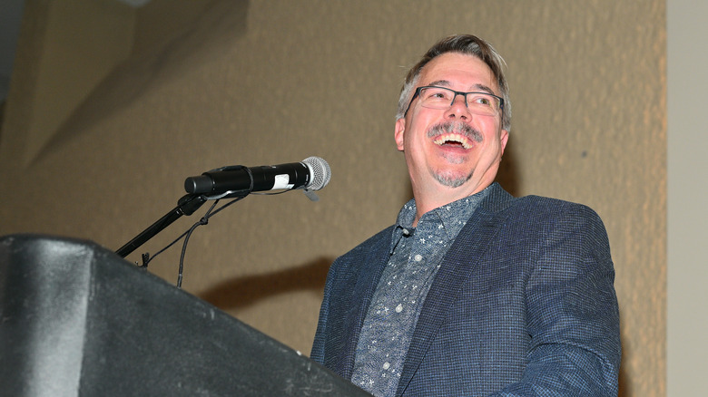 Vince Gilligan laughing at podium