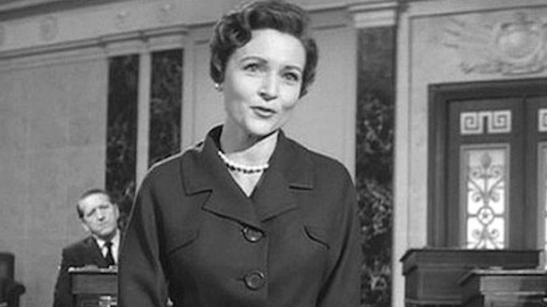 Betty White smirking senator