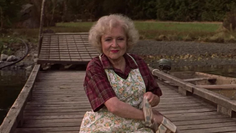 Betty White smug alligator feeding