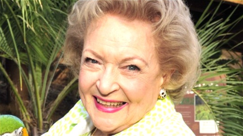Betty White smiling for photographers