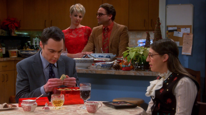 Sheldon opening Amy's gift of Christmas cookies