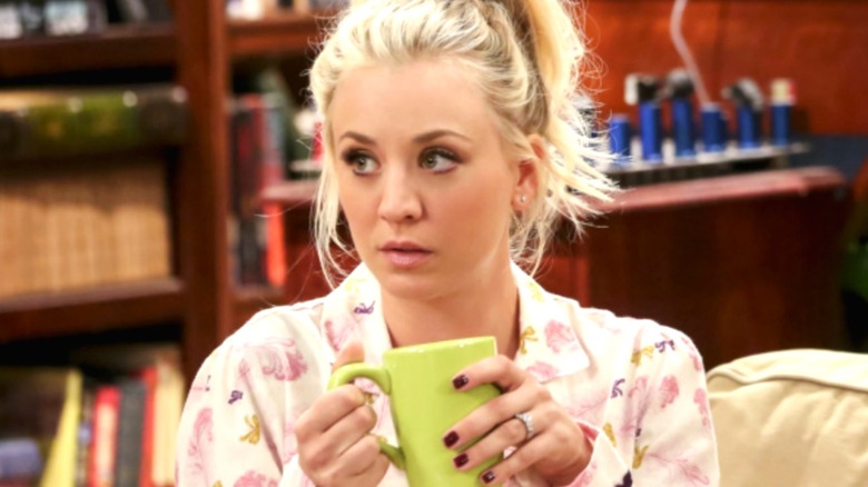 Penny holding a mug