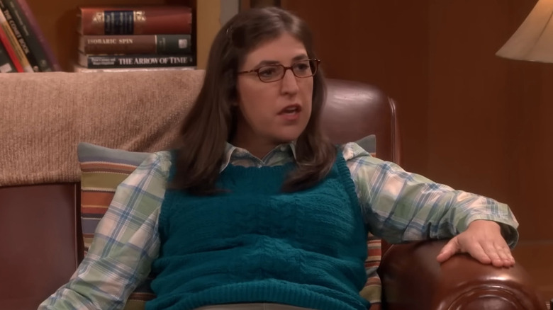 Amy Farrah Fowler sits in Sheldon's spot