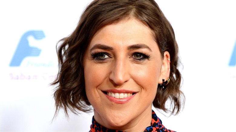 Mayim Bialik smiling at an event