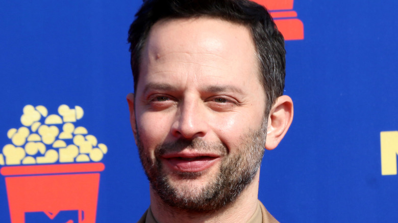 Nick Kroll blue background