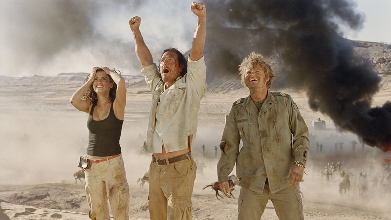 Eva, Dirk, and Al looking up in hope in Sahara (2005)