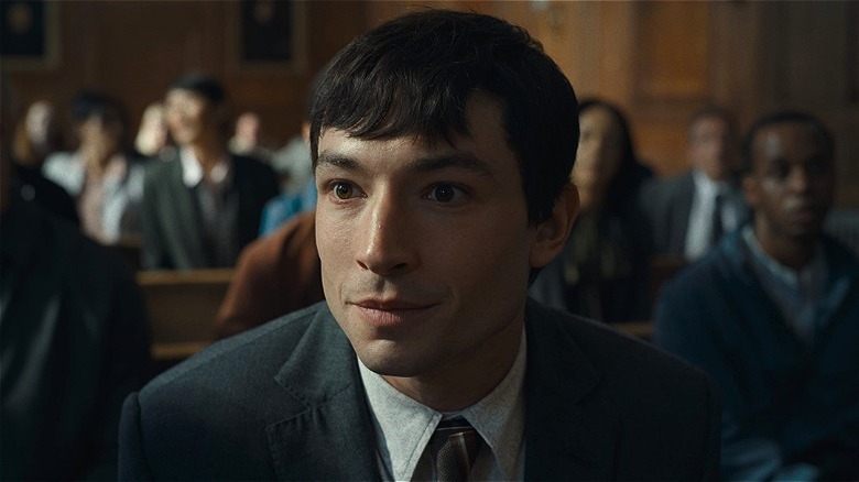 Barry Allen smiling in courtroom in "The Flash" (2023)