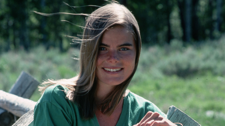 Mariel Hemingway leans against a fence in 1979