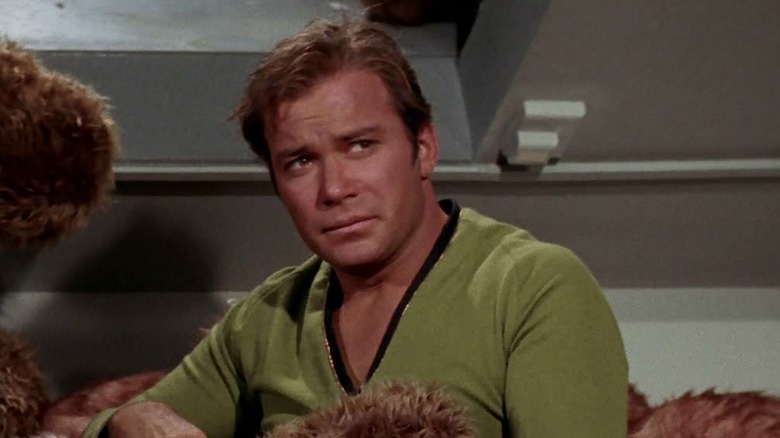 William Shatner as James T. Kirk, chest-deep in furry Tribbles in "The Trouble with Tribbles"