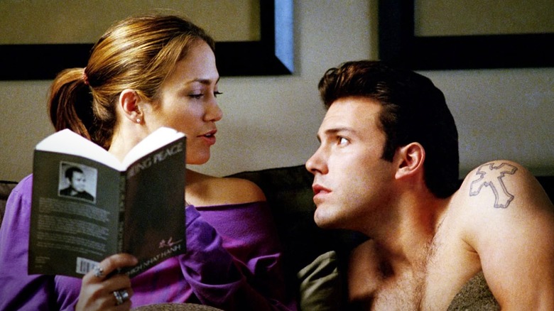 Ricki talking to Larry in bed in "Gigli" (2003)