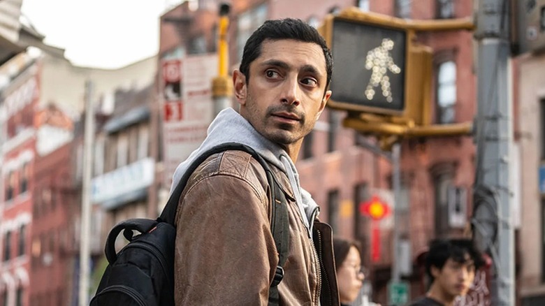 Ash checking if the coast is clear in "Relay" (2025)