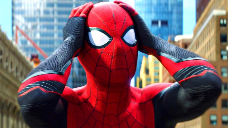 Spider-Man holds his head in confusion in 