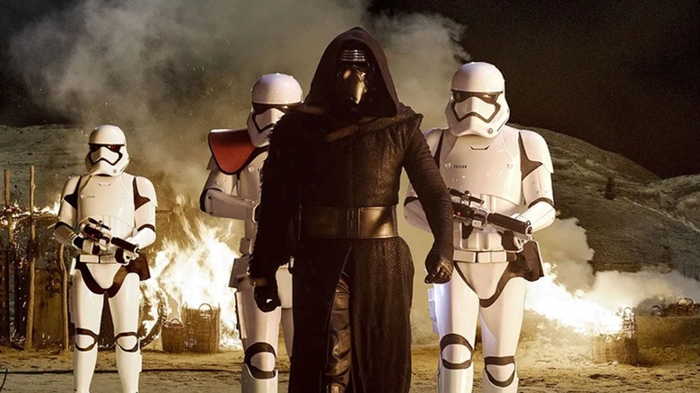 Kylo Ren walking with his Stormtroopers in "Star Wars: The Force Awakens" (2015)