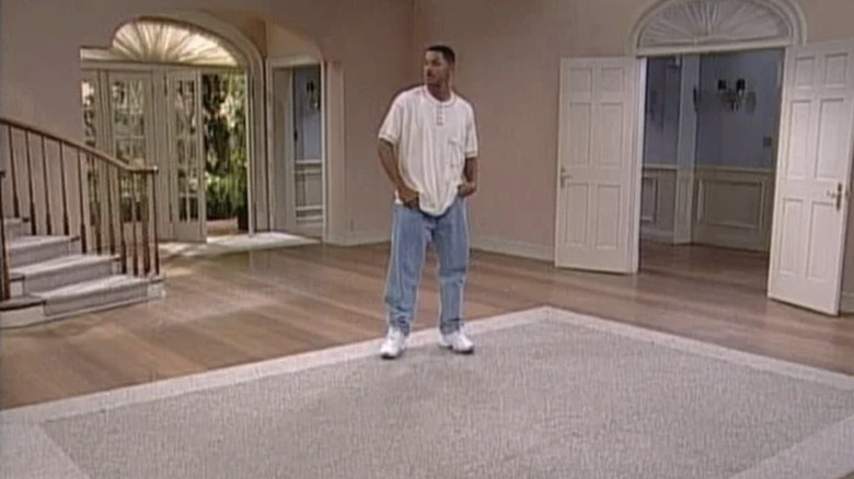 Will stands in empty living room